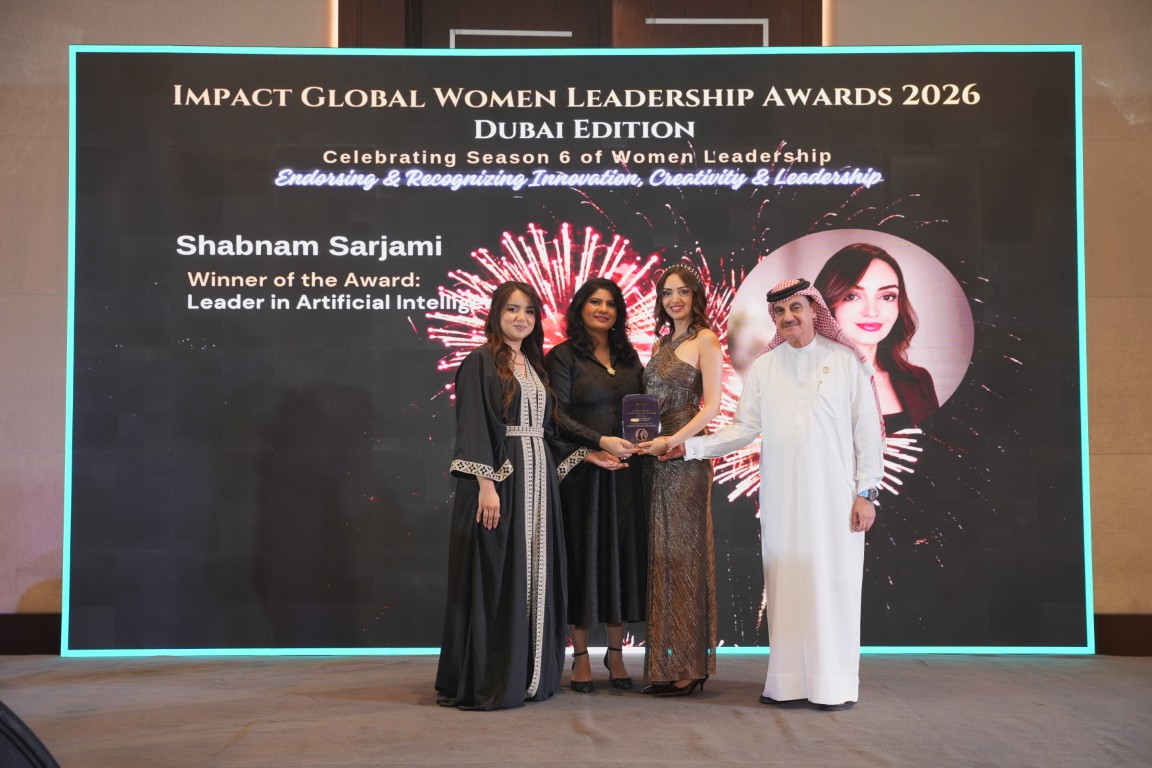 Shabnam Sarjami on stage during a presentation